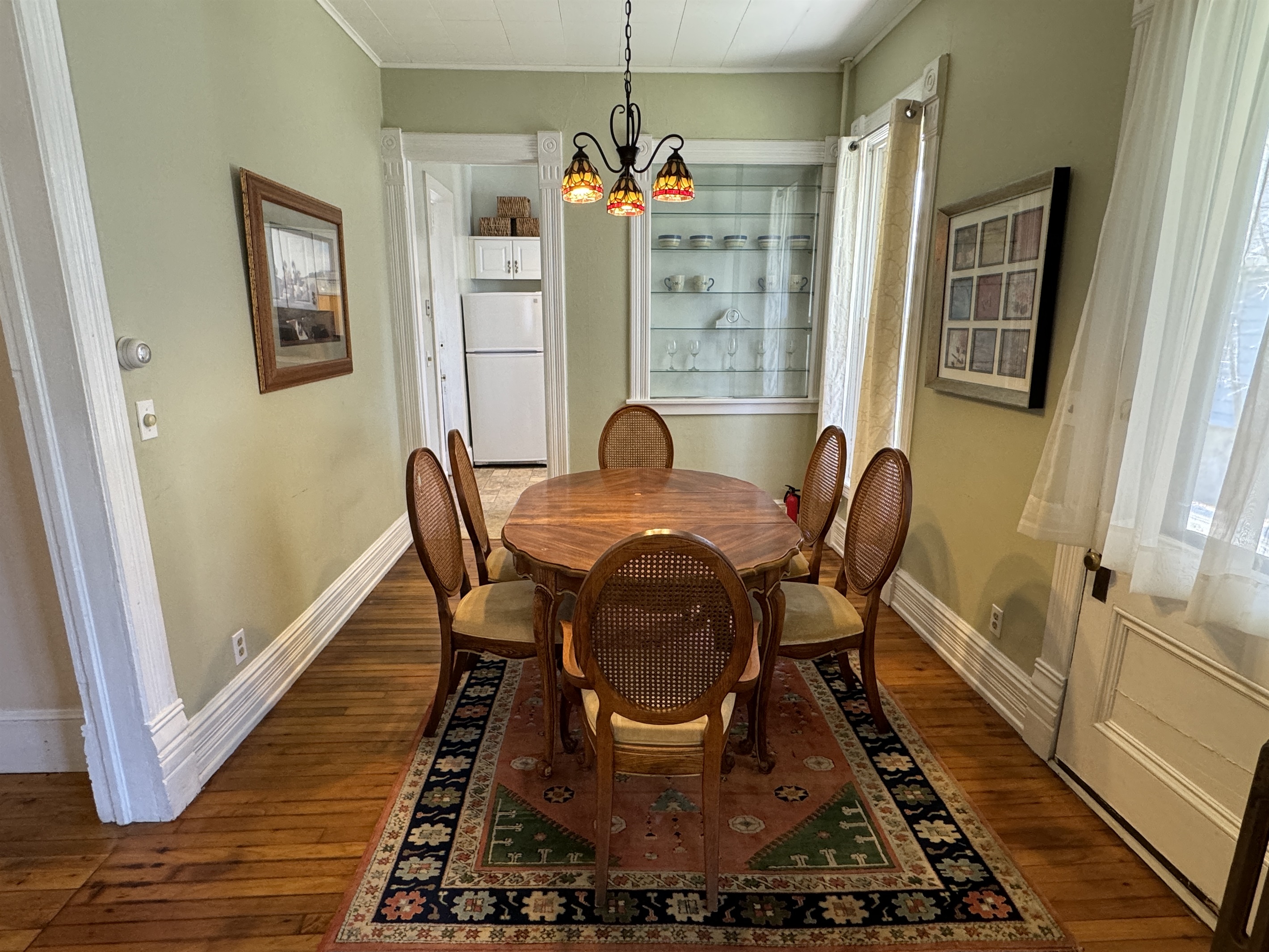 Dining room with beautiful built-in glass display cabinet