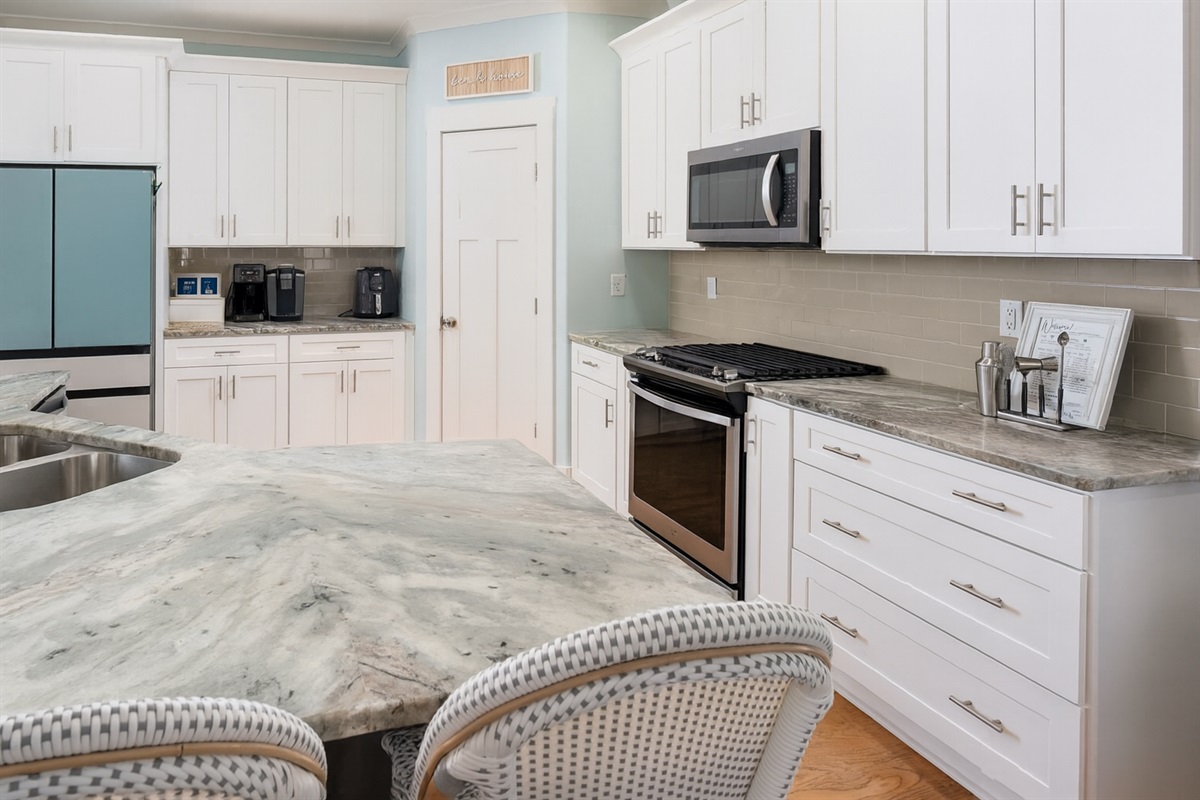 Fully equipped kitchen with generous prep space, modern appliances, and everything you need for easy meals at home.