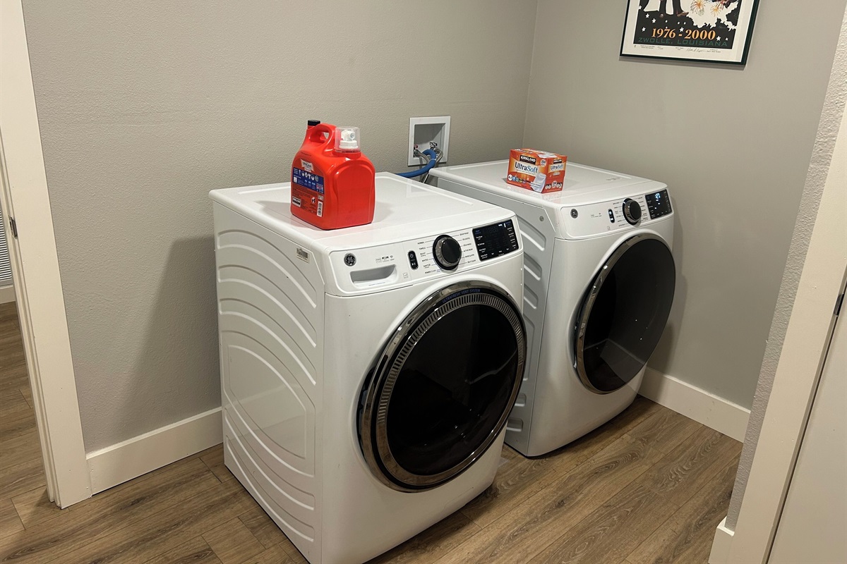 Dedicated laundry room with New GE Front load