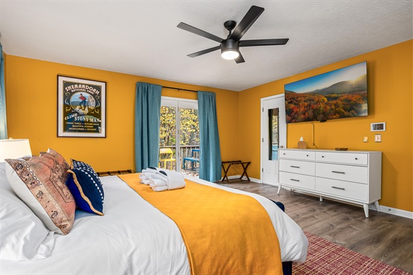 Wake up to warm colors, soft light, and your own private door to the deck — the perfect start to any mountain morning.