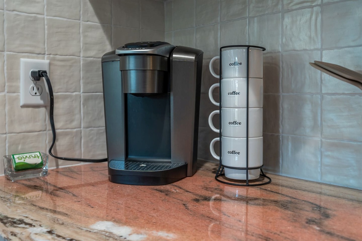 The Coffee Machine is a Keurig. 