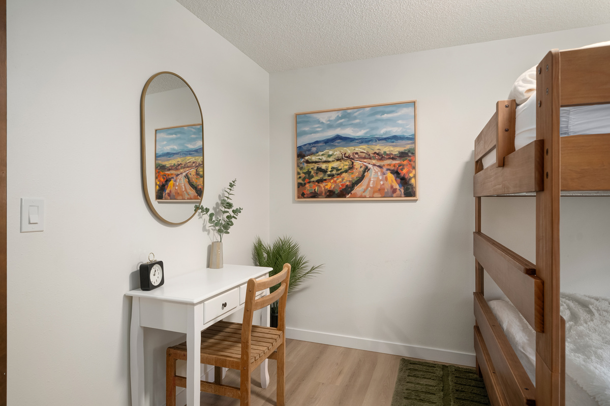 Thoughtful little touches make even the bunk room feel like home.