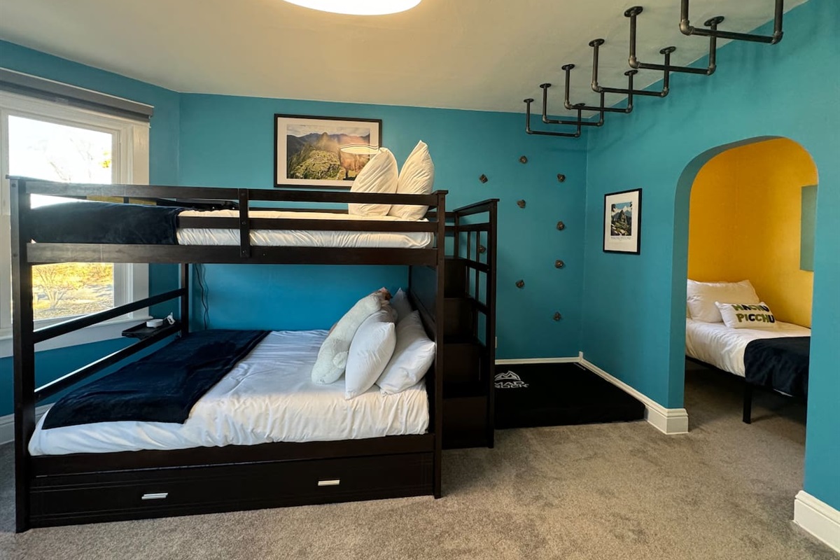 The Machu Picchu Bunk Room is ideal for kids, teens, and families. This Upper Level room sleeps up to 6 people in a Full over Full size bunkbed with a twin trundle bed that pulls out and separate twin bed in its own alcove.