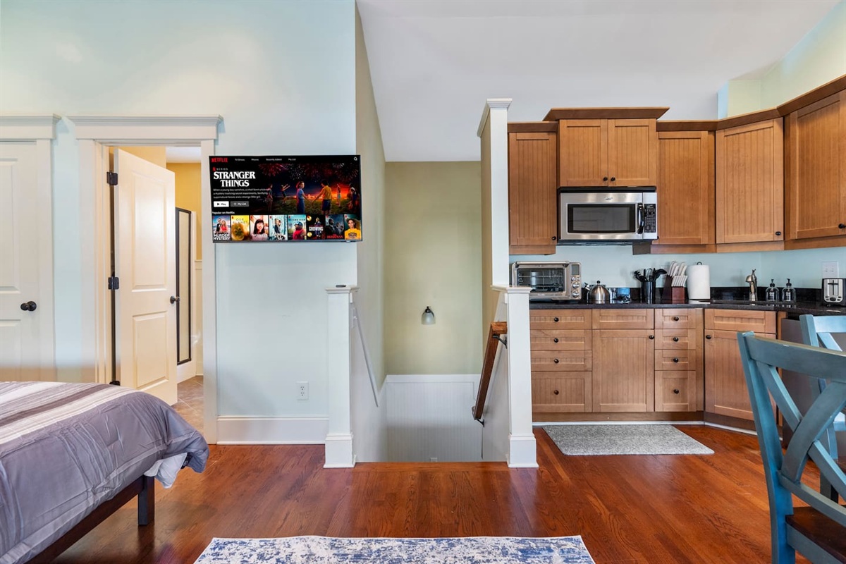 3" Smart TV visible from kitchen and living area — great layout for a studio