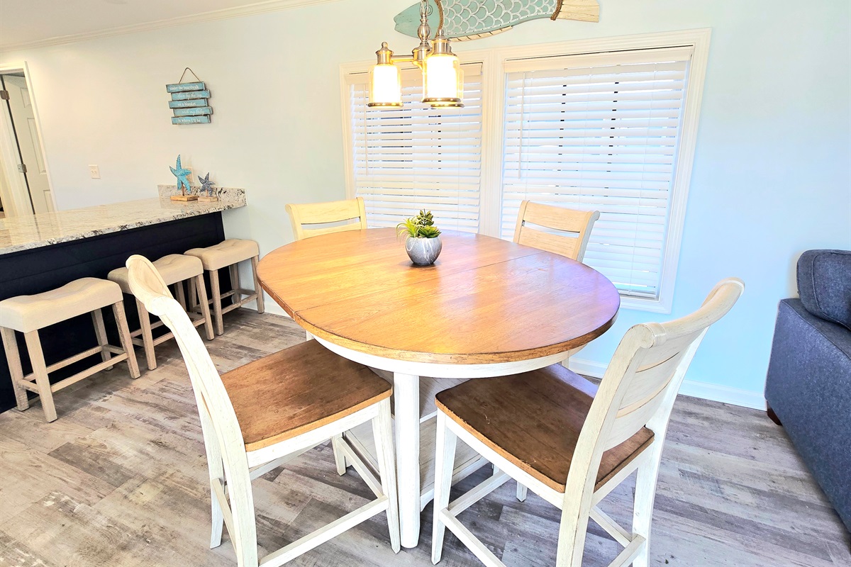 Dining table for 4 plus peninsula seating for 3