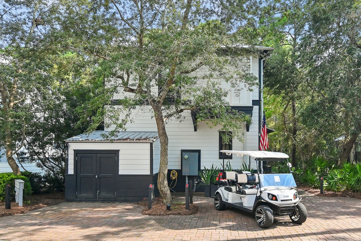Front Entry, Shed & Parking 
Parking for 2 vehicles (max) on the paved driveway.  The shed is stocked with five bikes, beach chairs, umbrellas, soft coolers & the 6-seater LSV (Low Speed Vehicle)—everything you need for carefree 30A beach days! ☀️