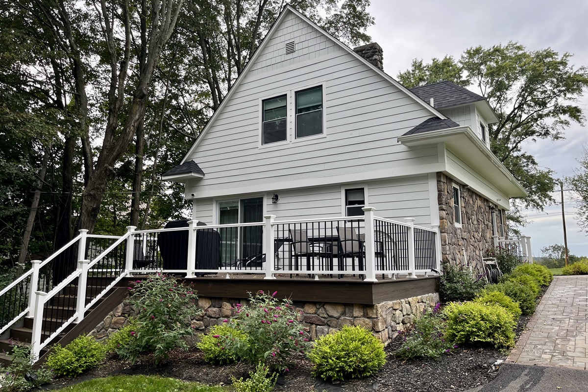 Large Outdoor Deck with Grill, Table and Chairs