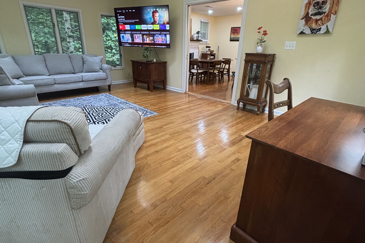 New Living Room: Bright, airy space with comfy seating and stunning nature views awaits. Living Room is equipped with Smart TV.