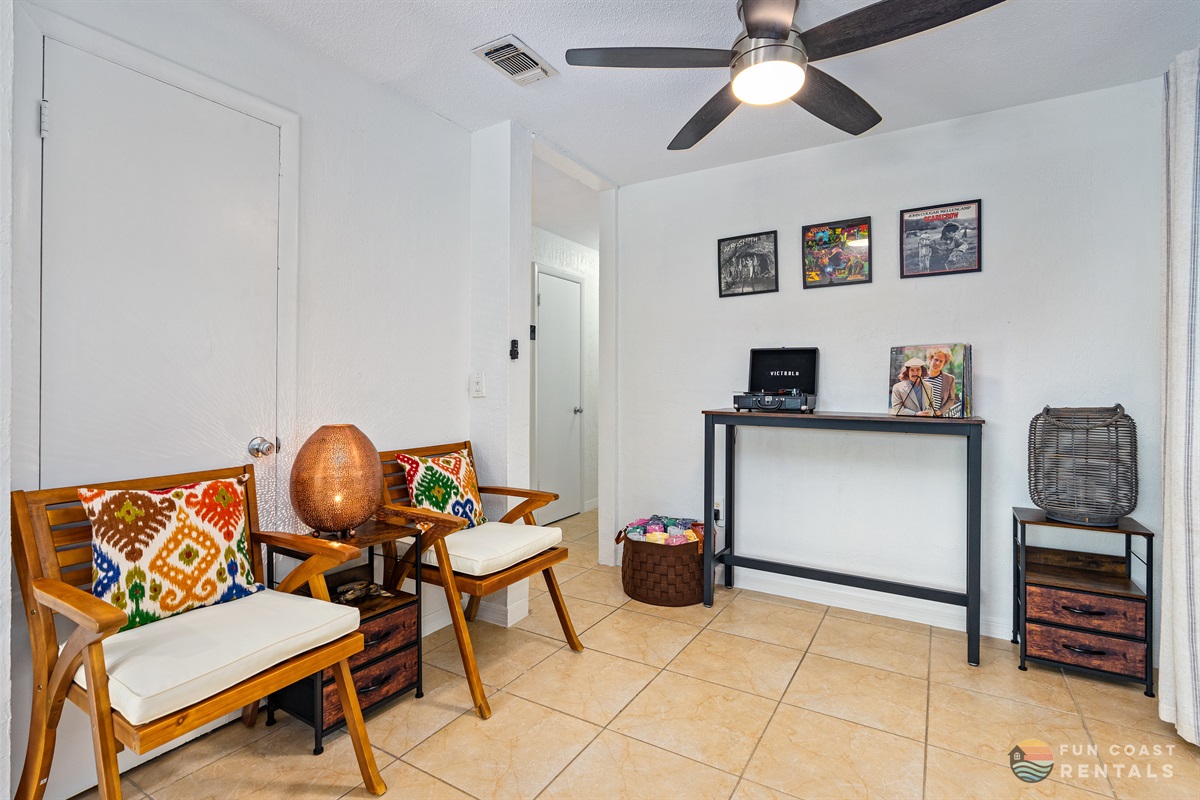 Spacious Living Room with ample seating and record player!