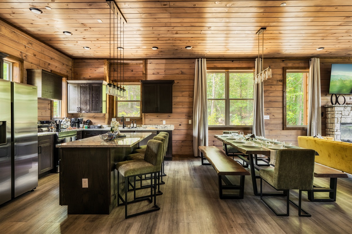Dining area and fully equipped kitchen — designed for group meals and entertaining.