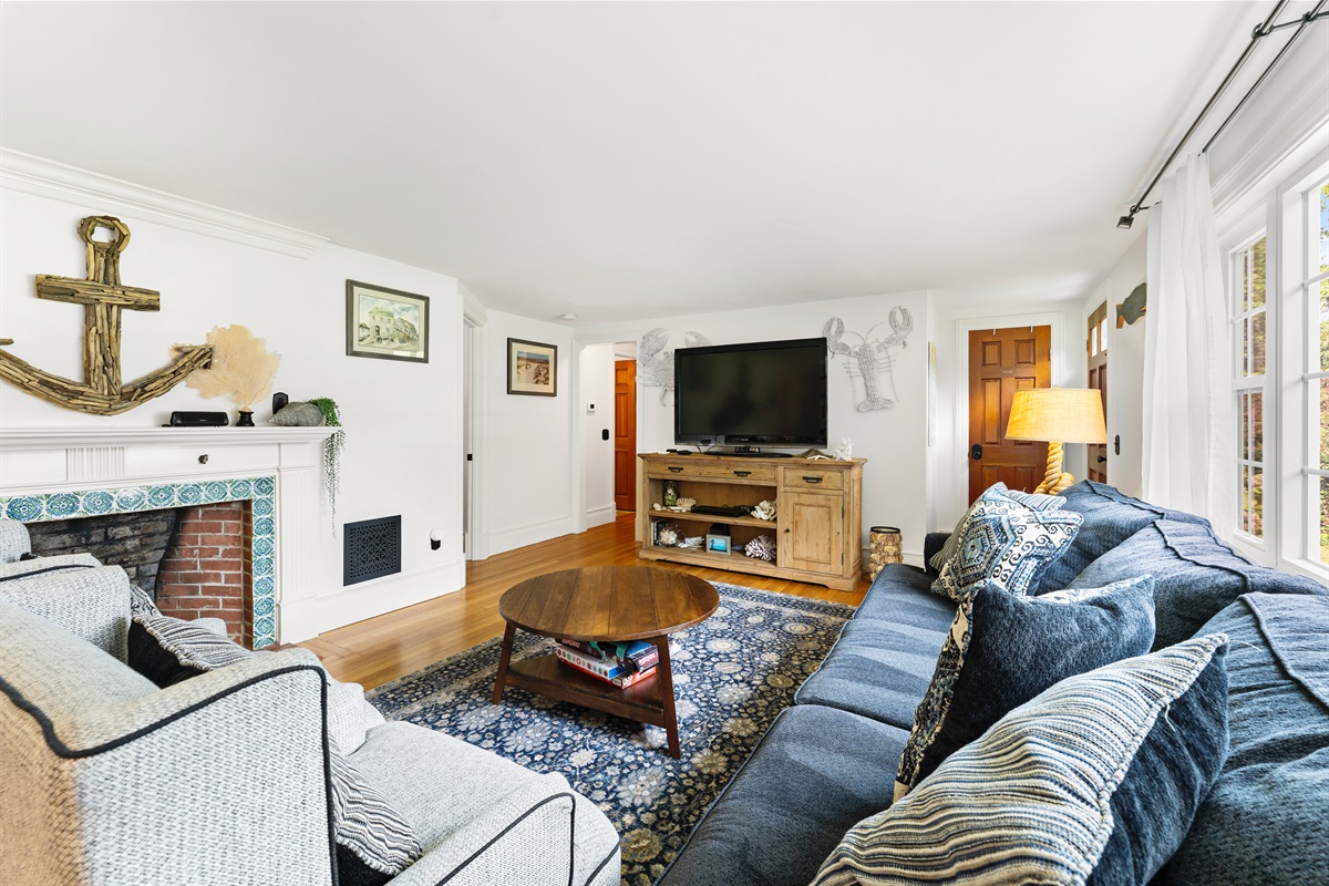 Gather, unwind, and enjoy your favorite shows in the spacious living room.