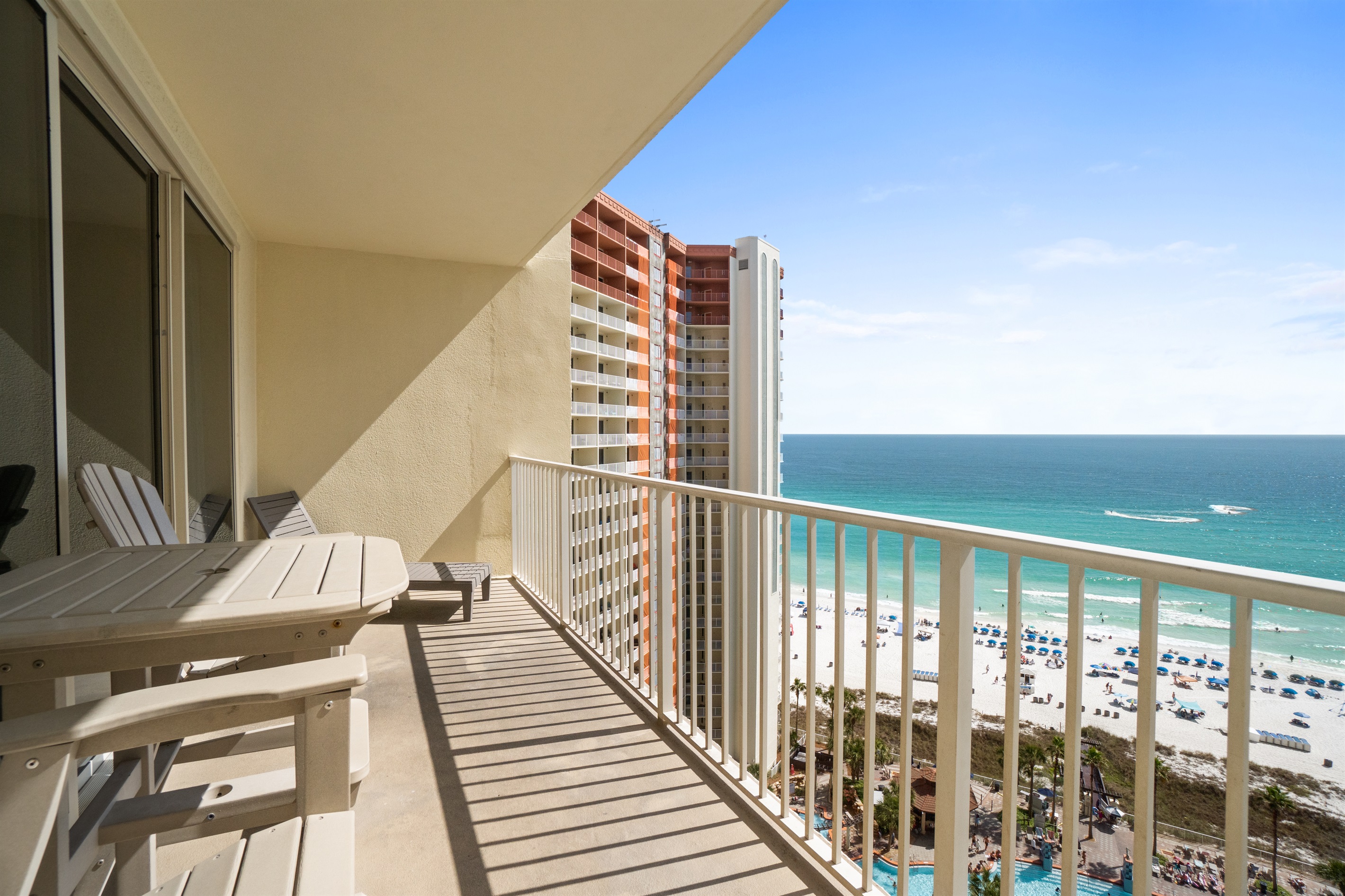 Two comfy tall adirondack style polywood chairs and a table to relax and take in the views.