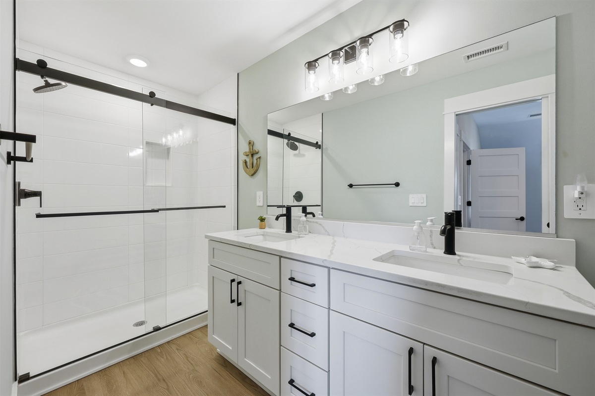 Modern king ensuite bathroom with double vanity and walk-in shower