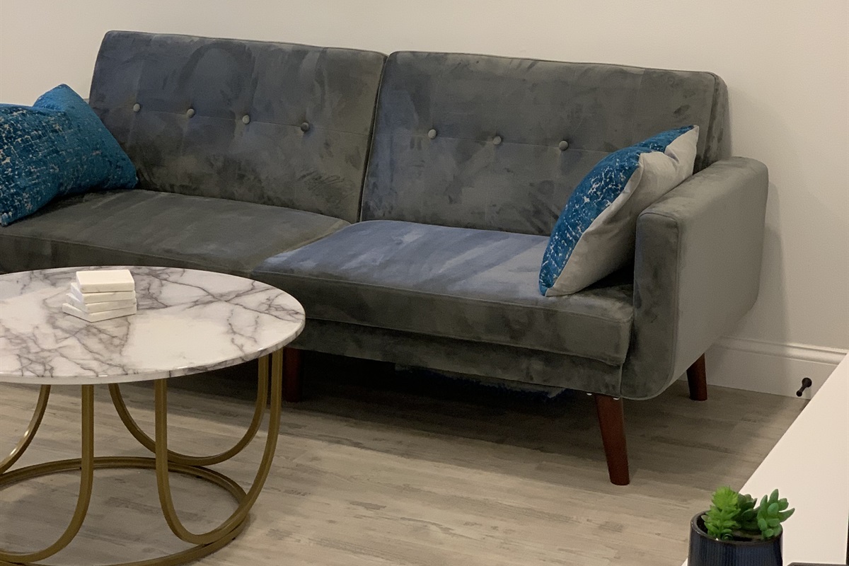Sofa that converts as a futon bed for a 3rd guest!