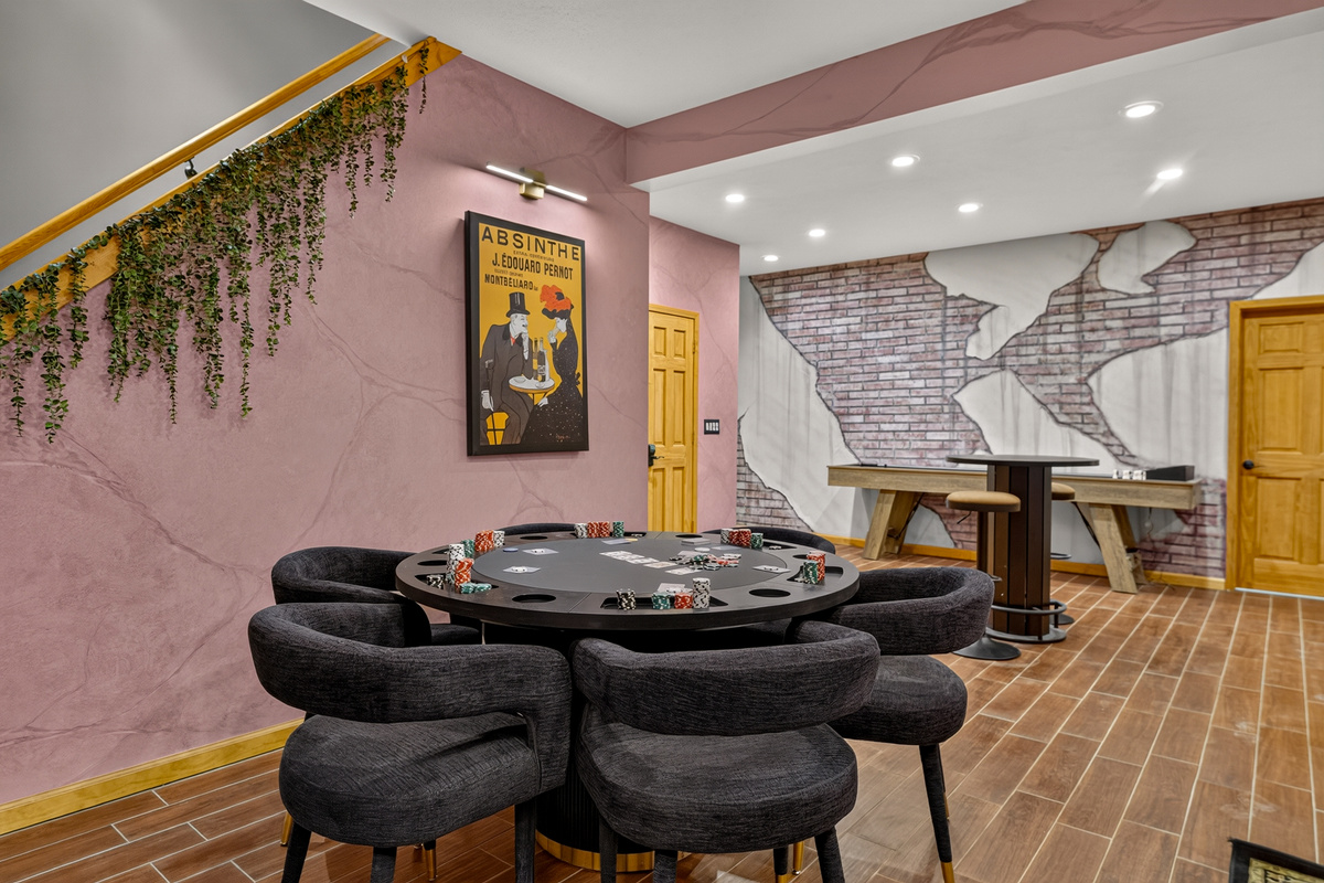 Poker table with seating and adjacent bar area