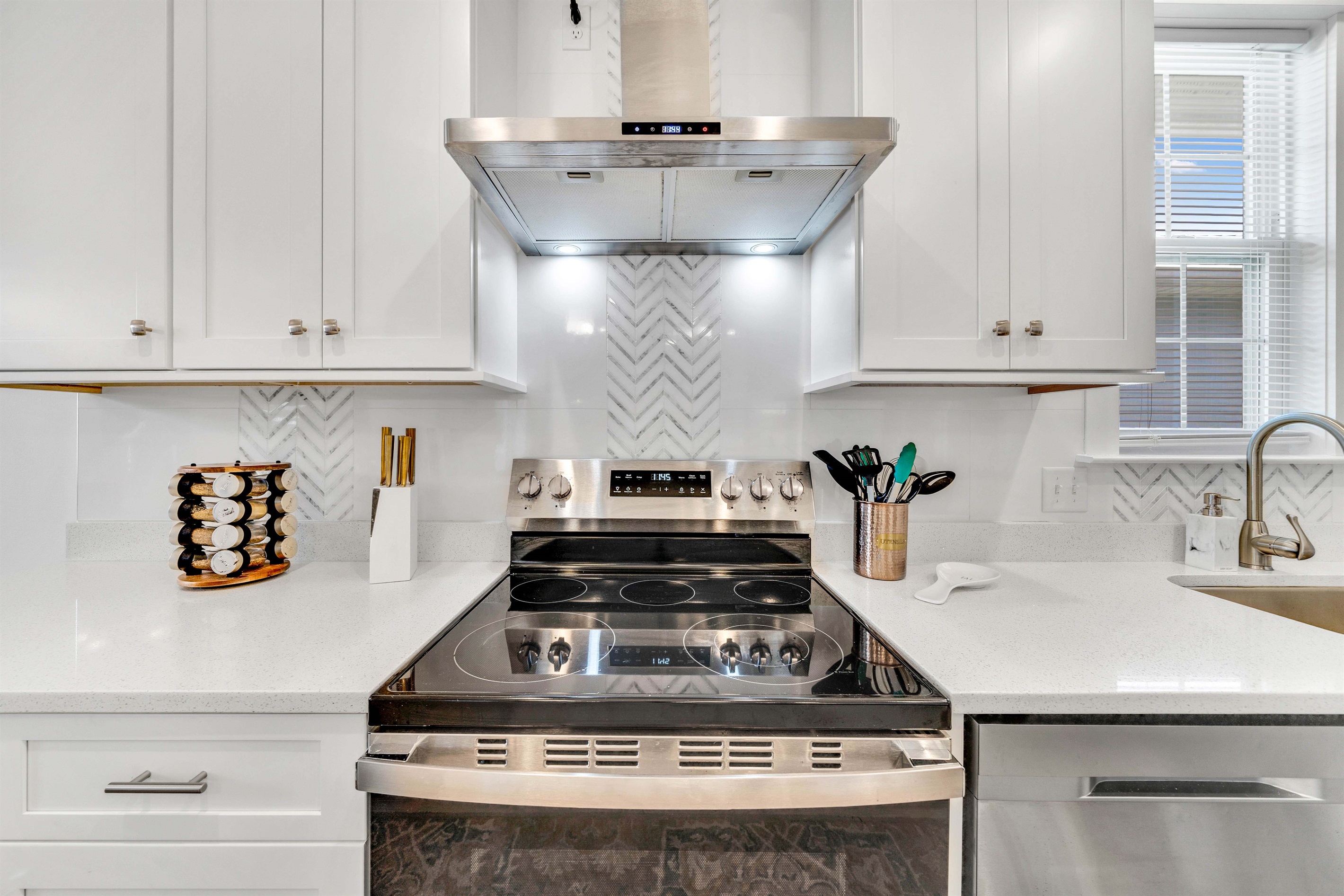 Cook a full meal using the modern electric stove and oven.