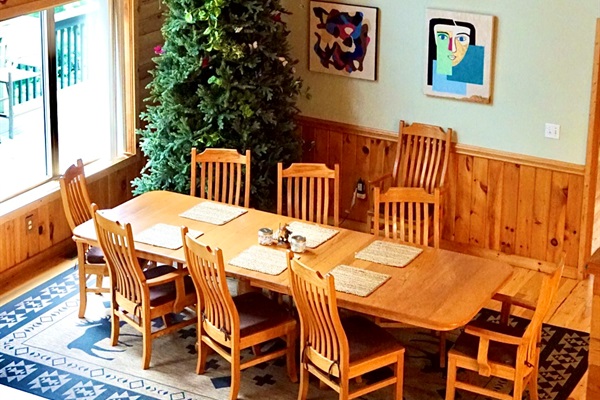 Gather around the spacious table under soaring ceilings and enjoy festive views!