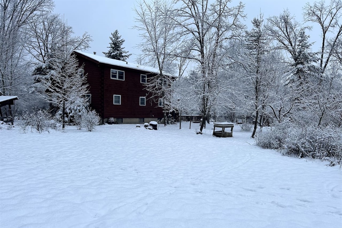Back view of log cabin.