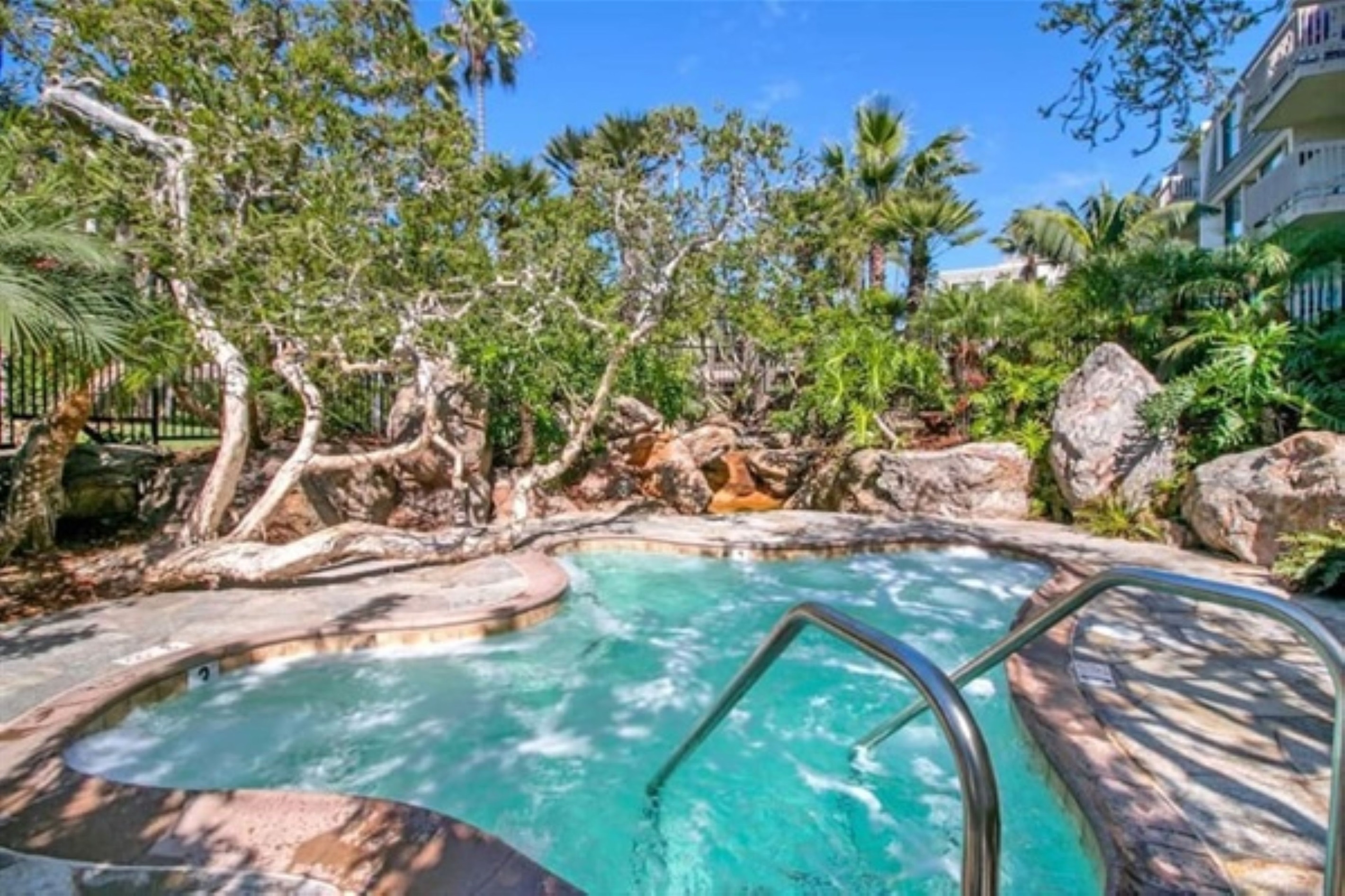 Oversized hot tub in a tropical setting
