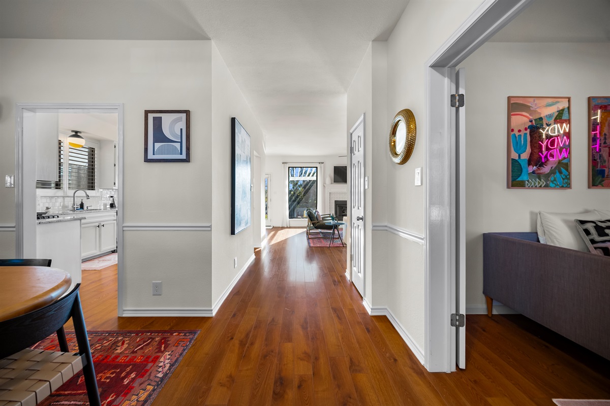 Stroll through the hallway linking dining, lounge room to laid-back living spaces.