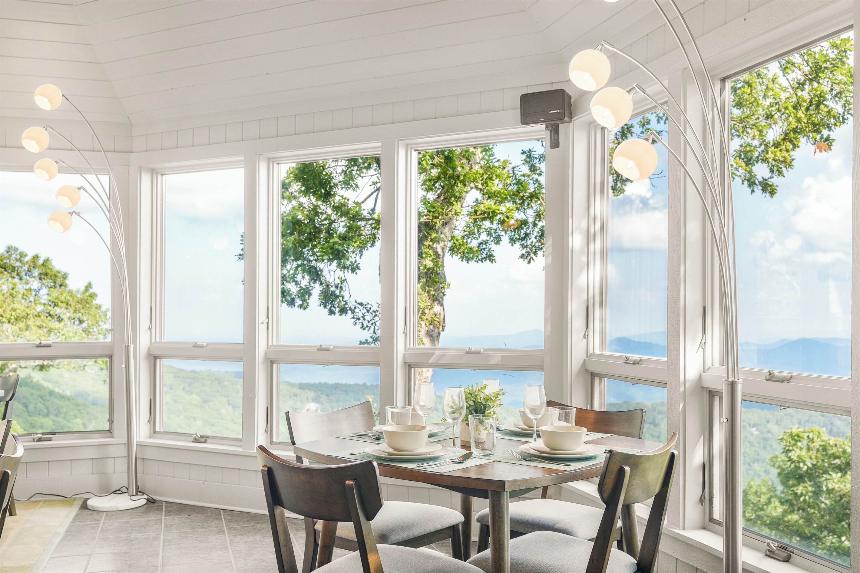 Dining room with seating for 20, glorious views, fireplace, and TV
