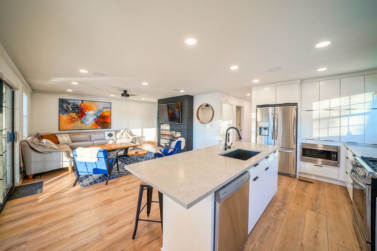 This open-concept space makes cooking, snacking, and lounging seamless — perfect for hosting your whole crew in comfort.