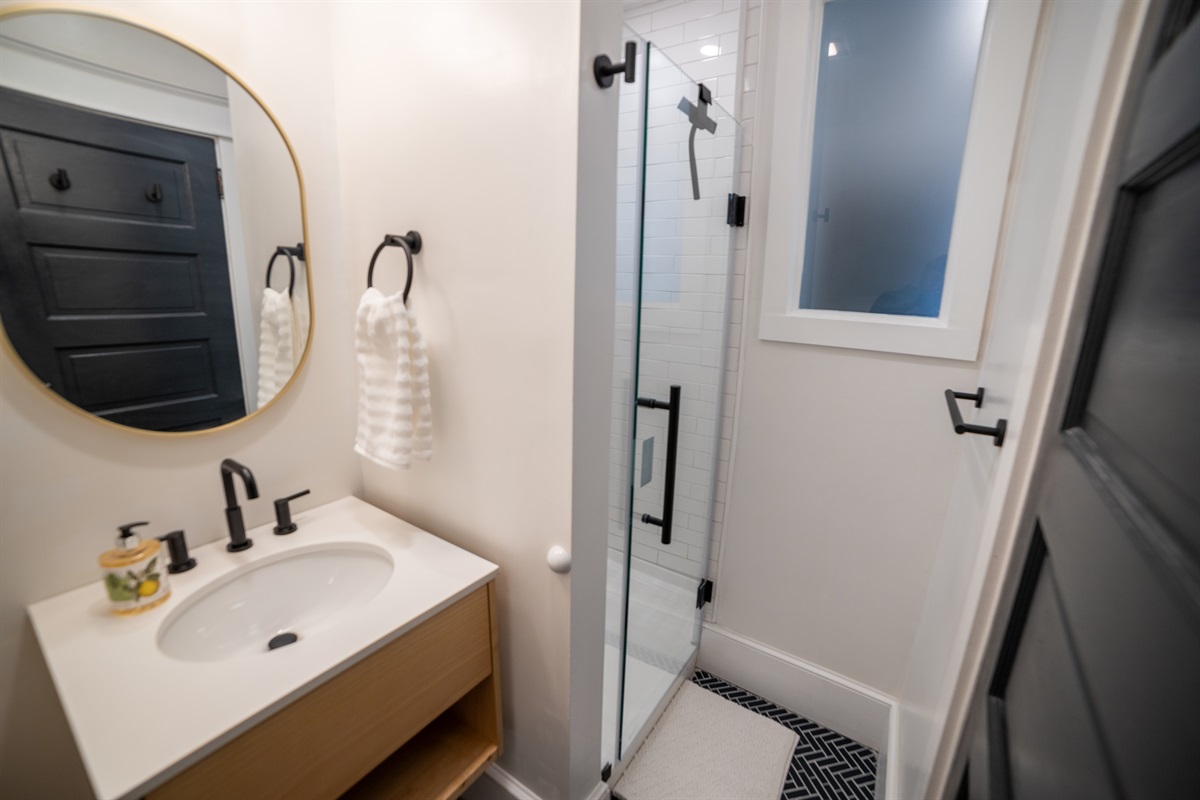  Full bathroom located off of hallway. 