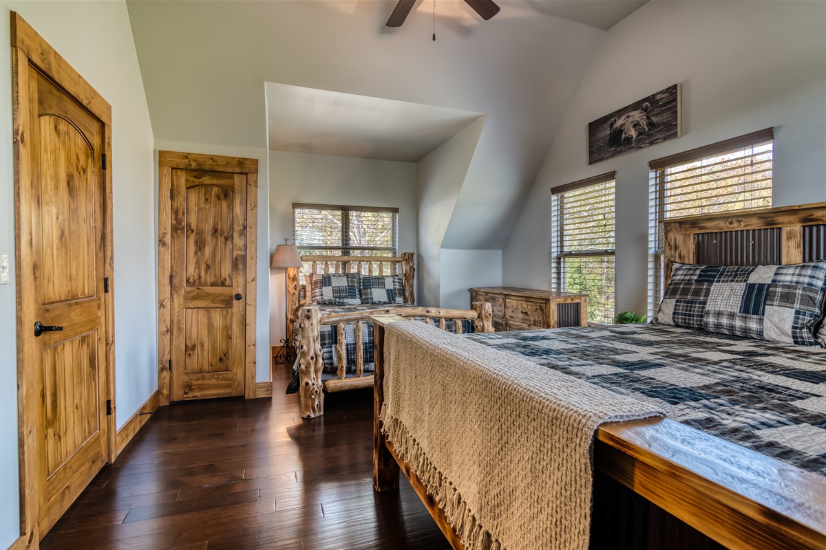 The two upper bedrooms each have King and a Queen bed in each room!