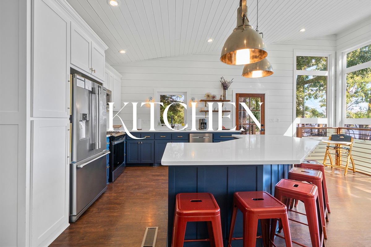 The kitchen: bold blue cabinets, modern appliances, and plenty of space to create meals.