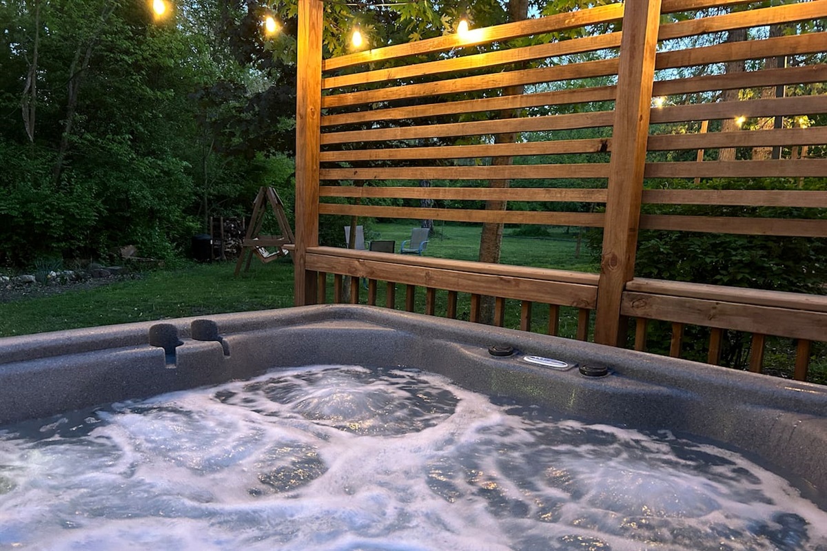 Relax in hot tub under the glow of the cafe lights.