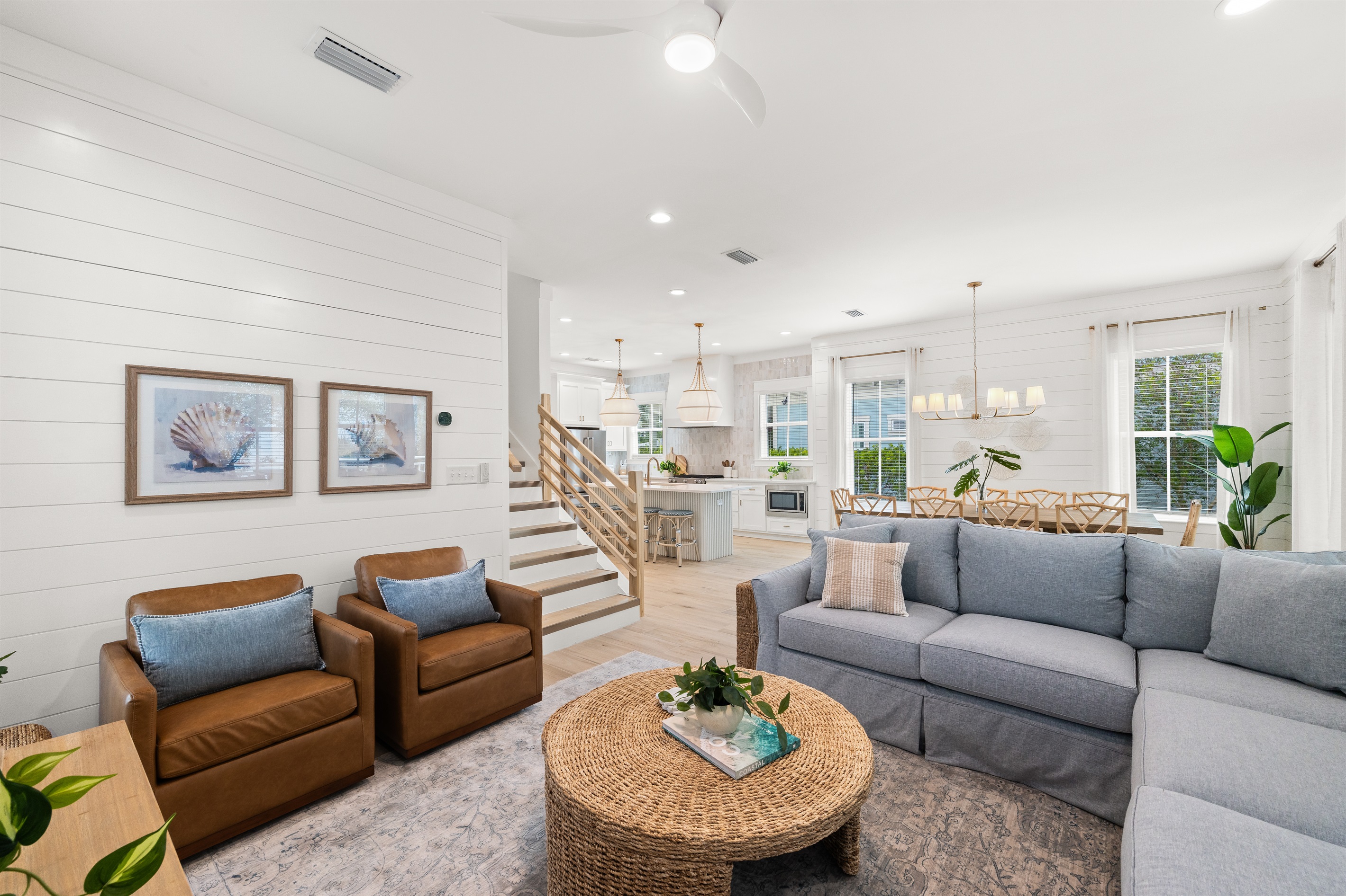 Filled with natural light and coastal charm, this inviting space encourages you to slow down, stay awhile, and enjoy the company of family and friends.