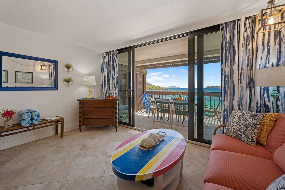 Enjoy seamless indoor-outdoor living with stunning ocean views just beyond the doors.