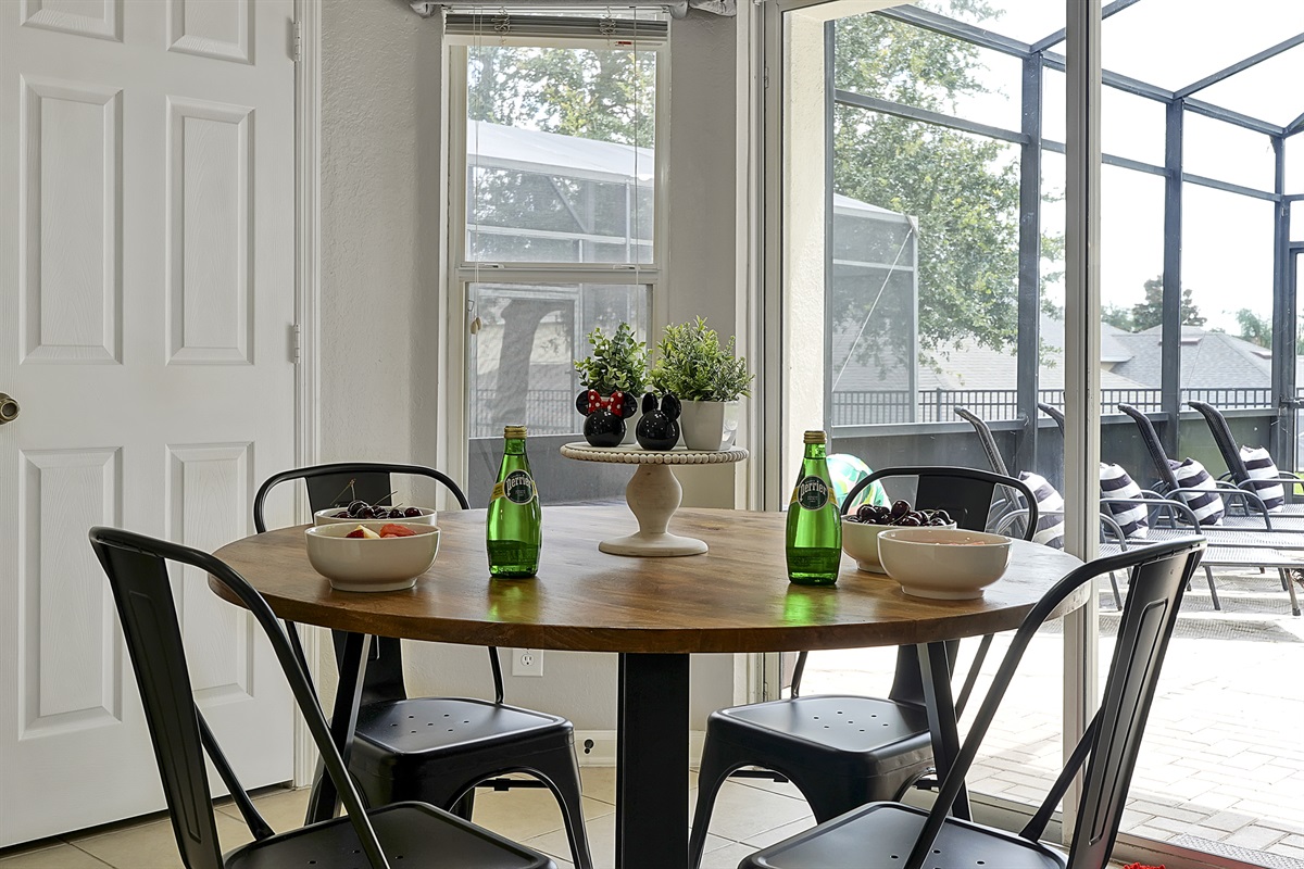 No need for food to be lining the counters here- behind the kitchen nook table is a shelved pantry ready to be stocked with all your favorite foods! Sit and grab a bite while you look out the window at your own private pool and spa.