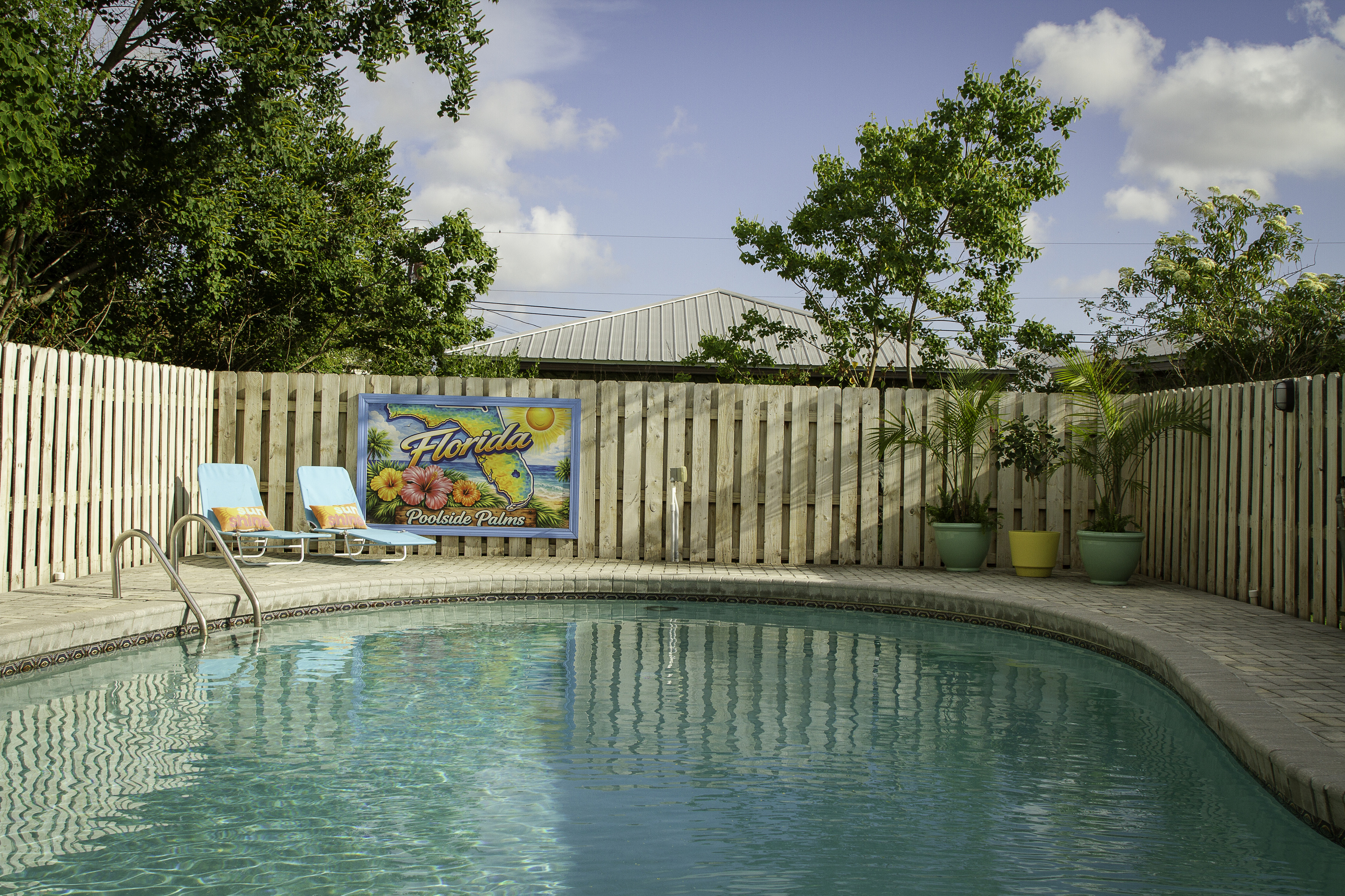 A full view of the pool looking from the entry gate