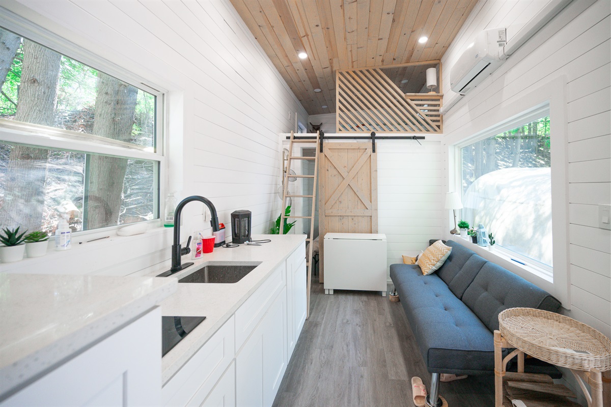 This trailer house is not included. It's vacant. For larger group, please inquire about adding it to your reservation for extra charge.