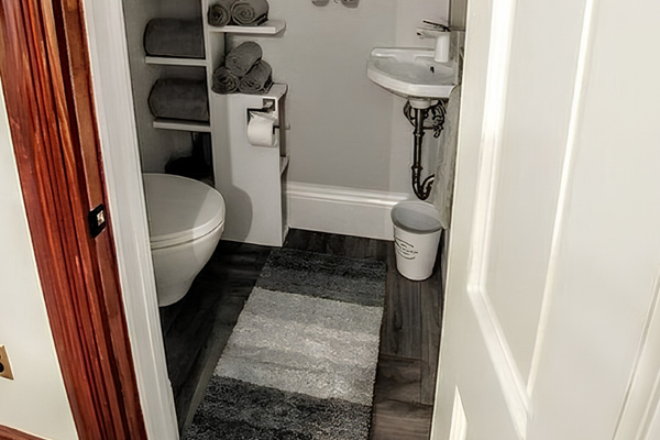 “Havre” bathroom provides sink, commode and fluffy towels