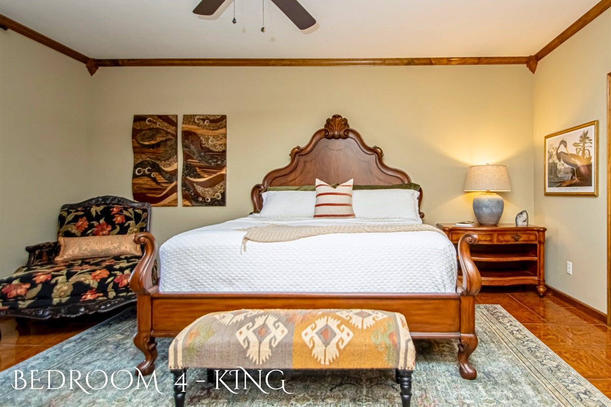 The Fourth Bedroom is on the Lower Level with a King Size Bed and Inviting Bedding