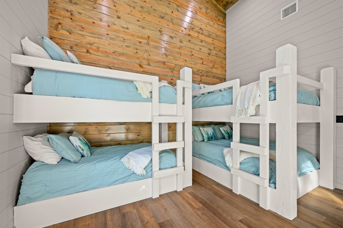 Double and Queen size bunks and cozy bedding make this a playful, welcoming space where memories are made and laughter comes easy.