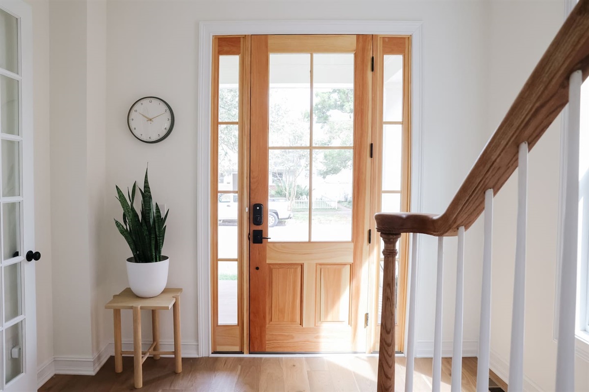 Enter the house through the wraparound porch. The downstairs features living, dining, kitchen, a full bathroom and a bedroom. 