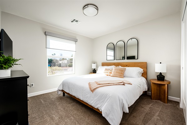 Bedroom 5 has plenty of space and another king sized bed.