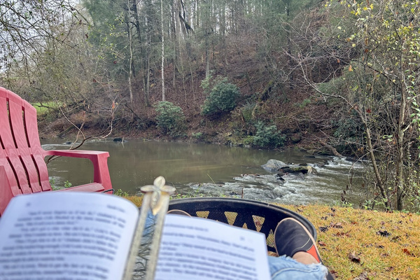 A good book and the sound of a cascading waterfall makes for a great day!