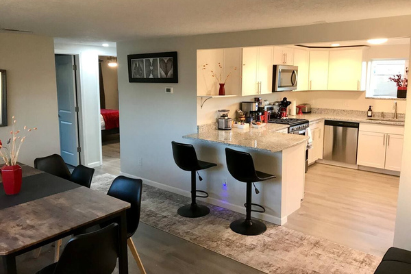 This open kitchen design is great for conversation while you’re cooking. It’s even better for conversation -if somebody else is cooking. Room for 10-12