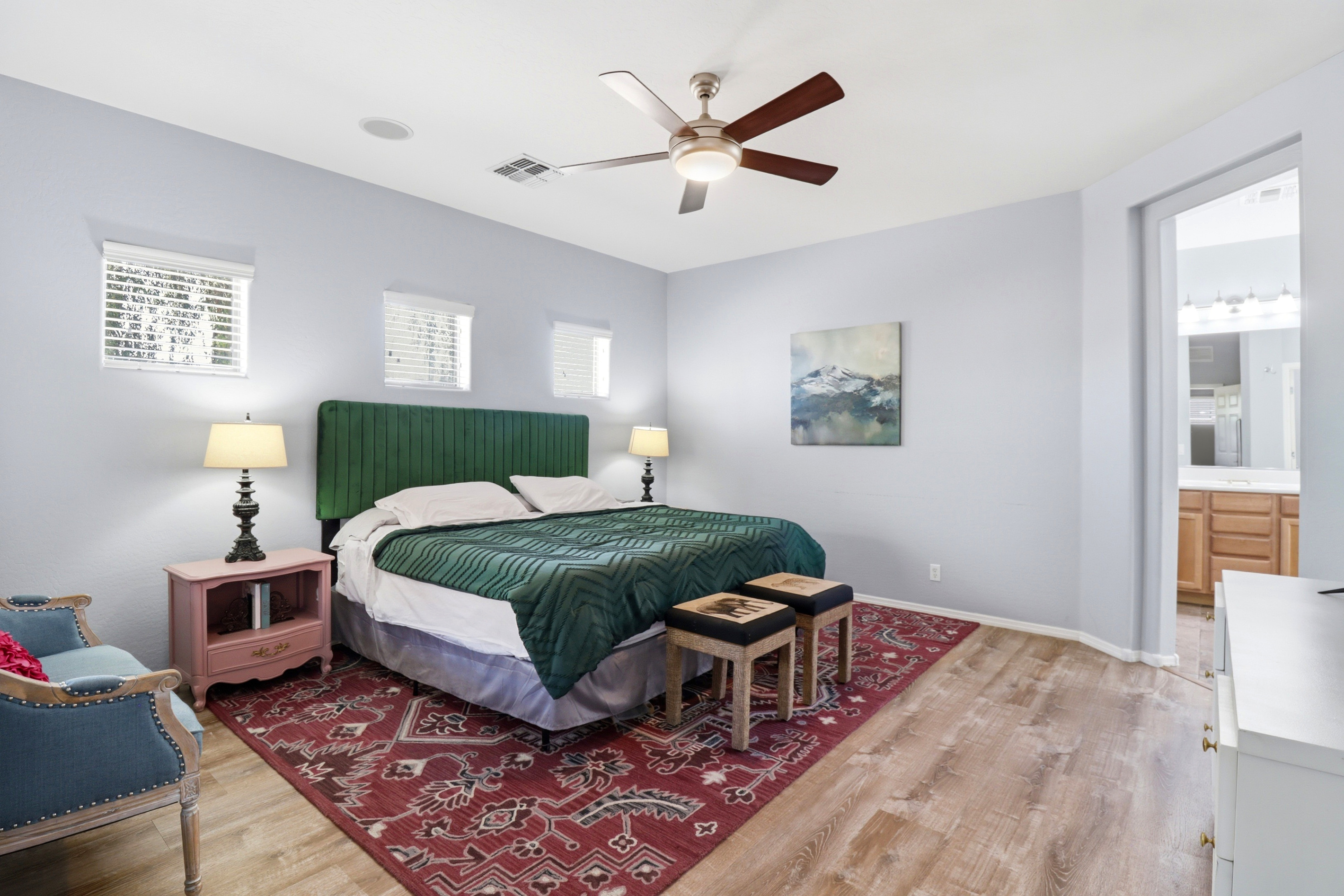Master bedroom with a king bed, ensuite bathroom access, and plenty of room to settle in.
