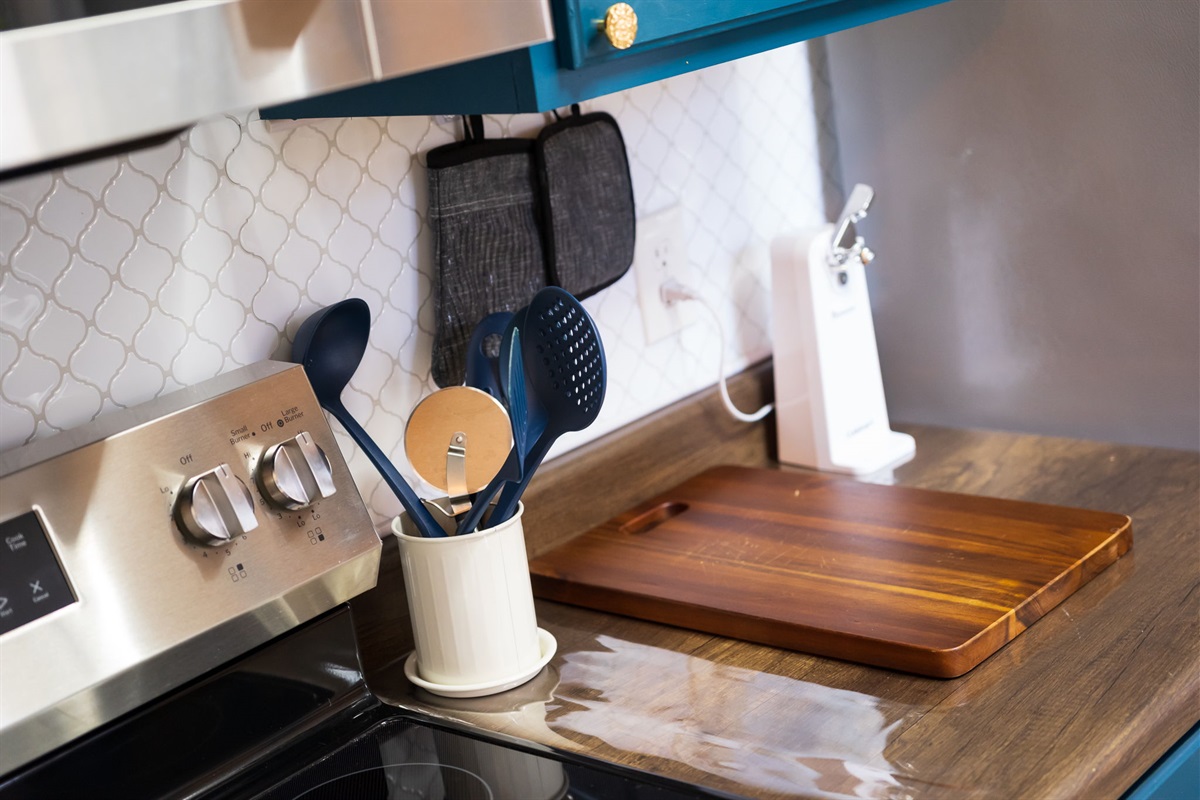 Electric stove top, can opener, and cooking utensils provided!