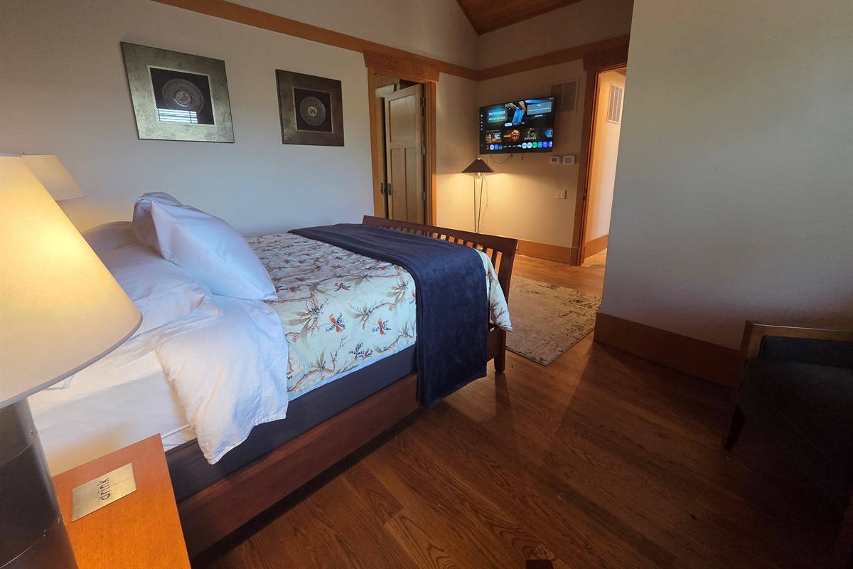 Third bedroom in main house with a queen bed