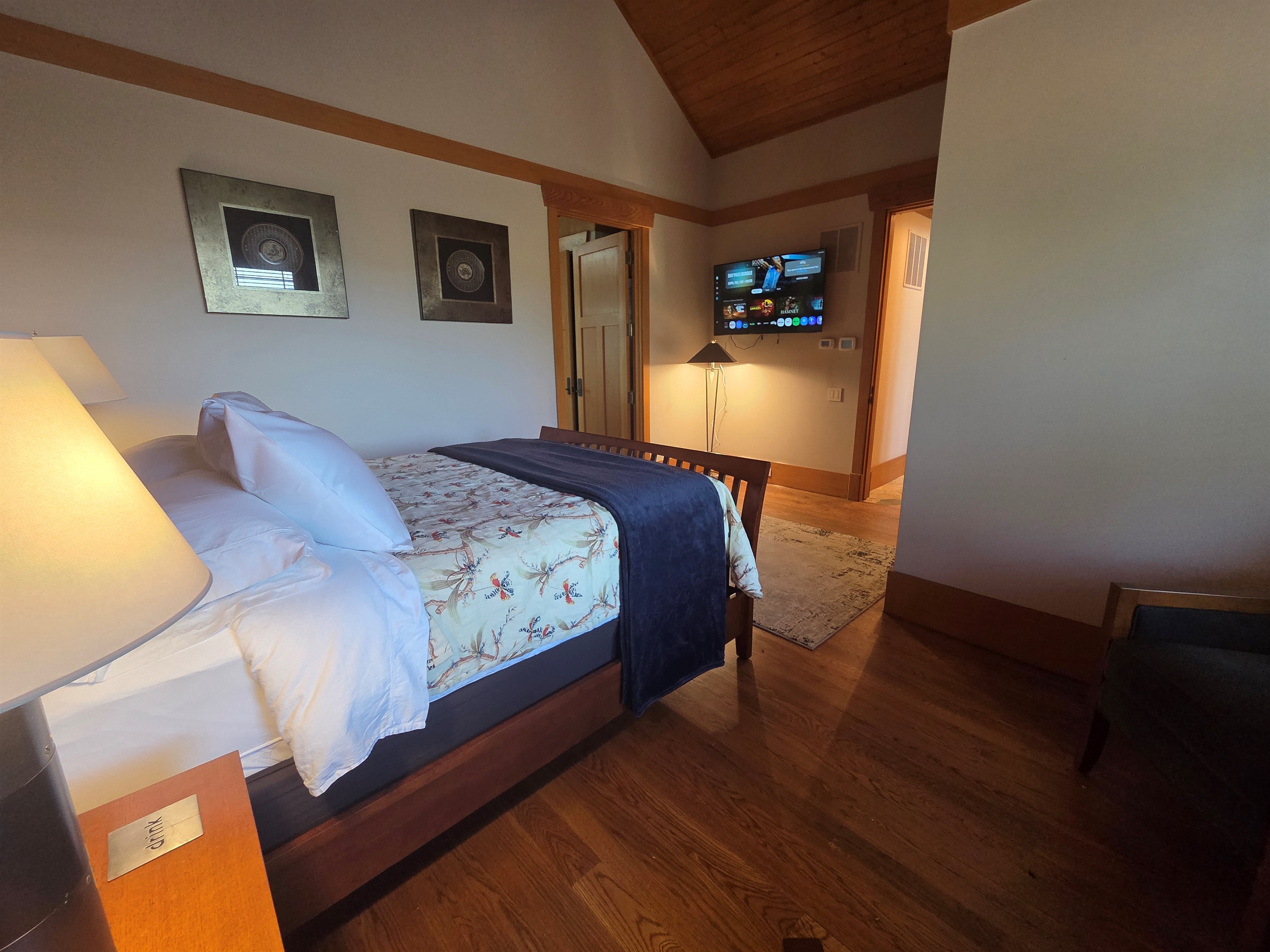 Third bedroom in main house with a queen bed