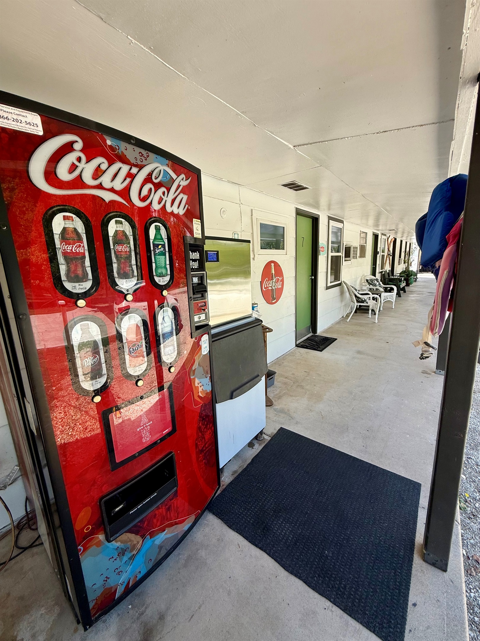 Free Ice located by coke machine on the back of the building.
