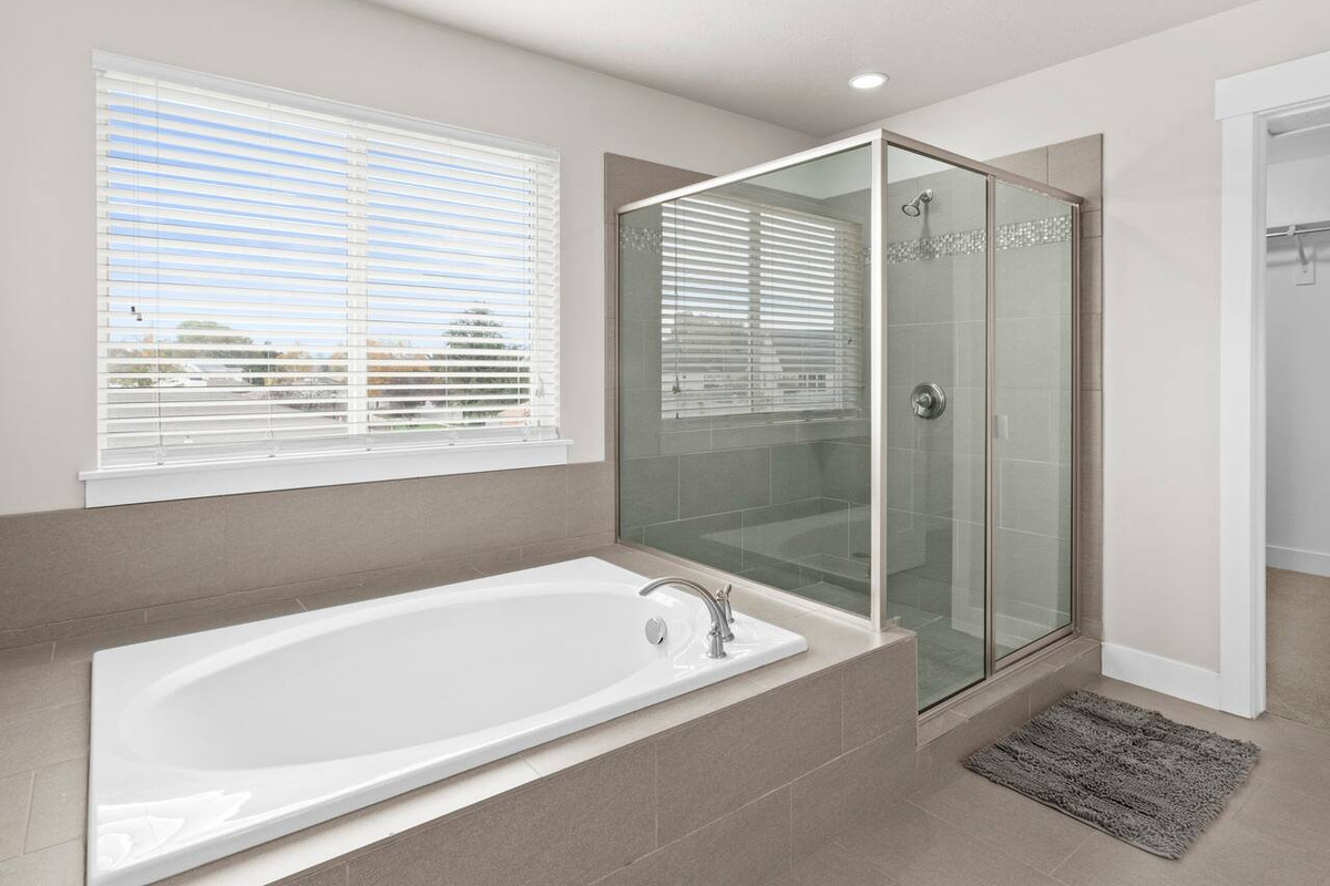 Roomy & Stylish Haven: Primary Bathroom, Upstairs