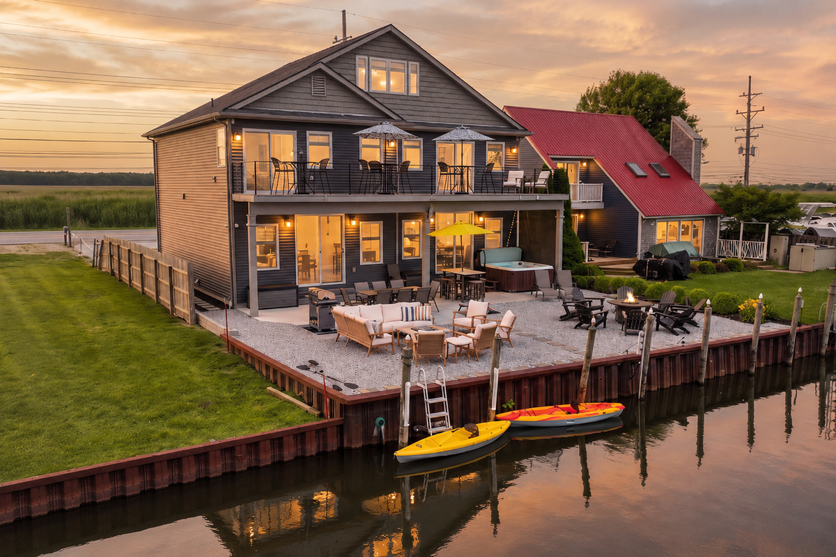Your private waterfront retreat awaits—complete with a BBQ, hot tub, kayaks, fire table, and unforgettable Lake St. Clair sunsets.