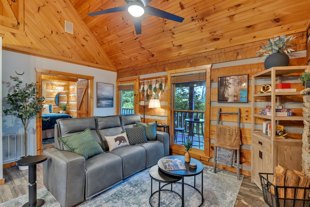 Comfortable living space with cabin charm and access to the porch